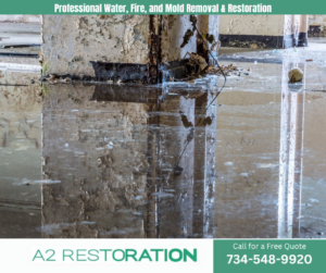 A flooded floor in a commercial building requiring water damage restoration by A2 Restoration in Ann Arbor, MI.