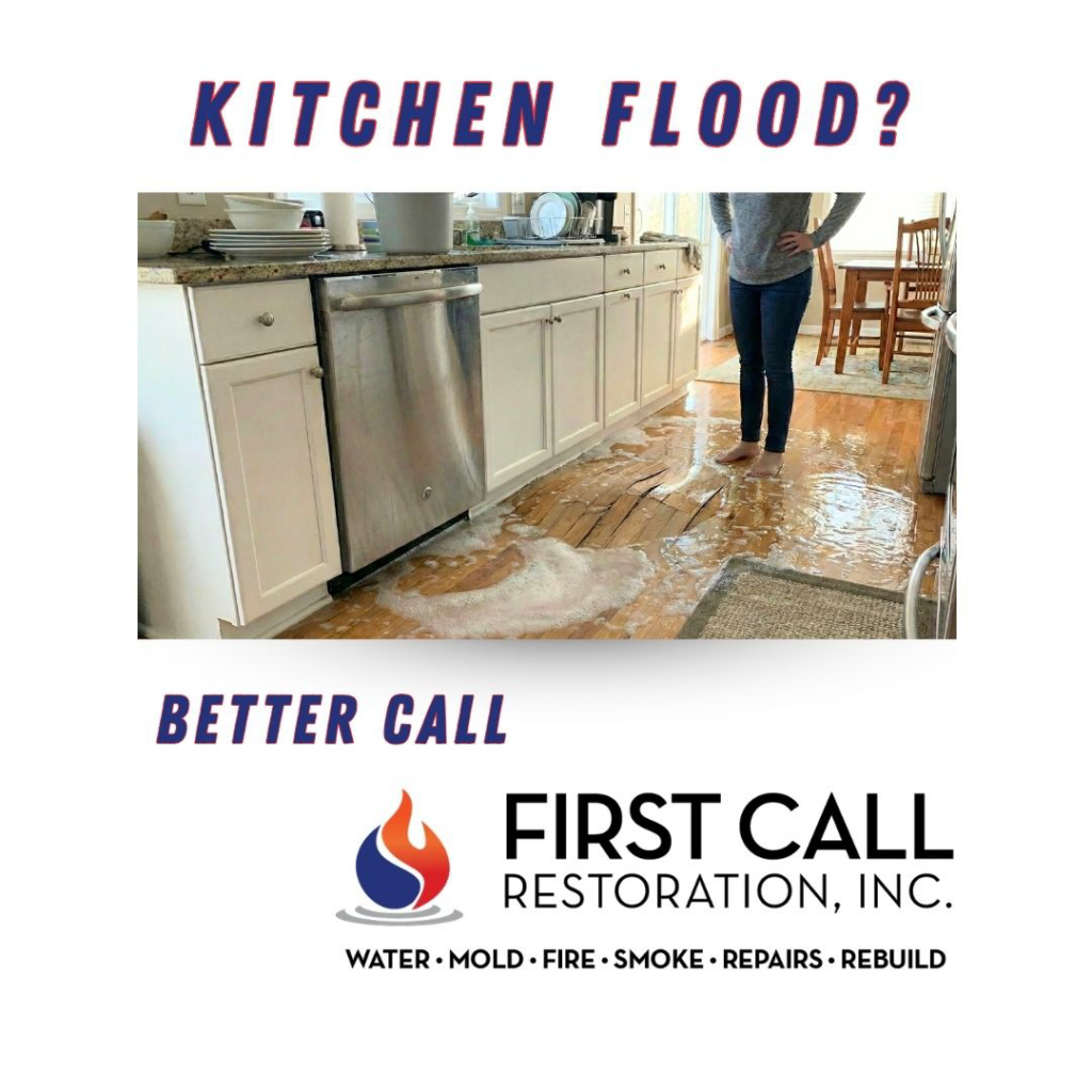 A kitchen floor covered in water from a flood, showing water damage restoration work by First Call Restoration in Kansas City, MO.