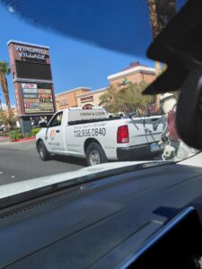 Fresh & Clear Pool Service Inc. company truck on the road, ready to serve clients in Henderson, NV.
