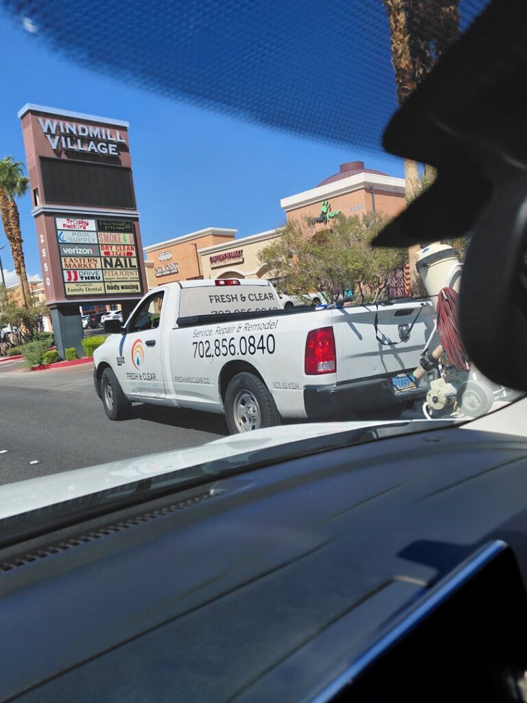 Fresh & Clear Pool Service Inc. company truck on the road, ready to serve clients in Henderson, NV.