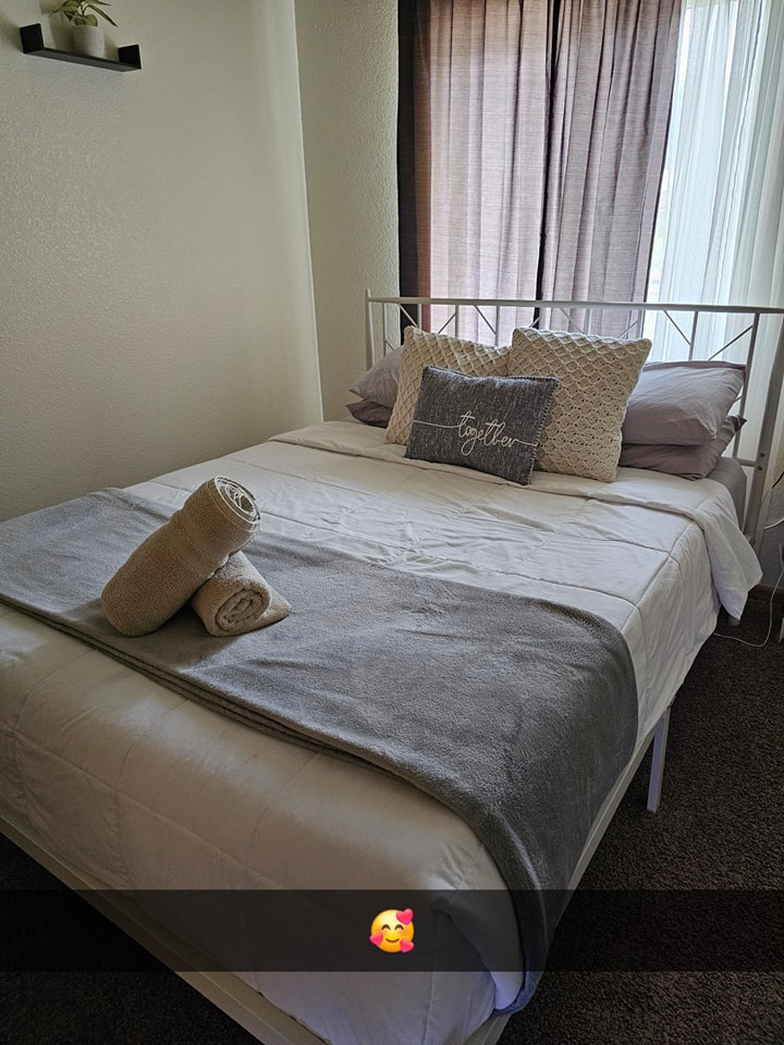 A freshly cleaned and neatly made bedroom by Nikki Sue's Cleaning Services in Gillette, WY.