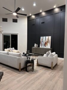 A freshly cleaned modern living room with comfortable furniture, expertly cleaned by Cleaners of Arizona in Chandler, AZ.