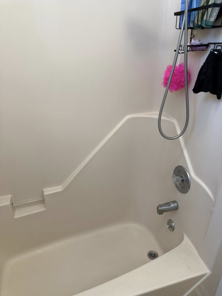A freshly cleaned shower and bathtub, showcasing meticulous work by Spotless Cleaning Operations LLC in Lancaster, PA.