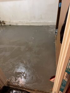 A freshly cleaned and wet floor, demonstrating the thorough cleaning services provided by Ragin Cleaning Services in Owings Mills, MD.