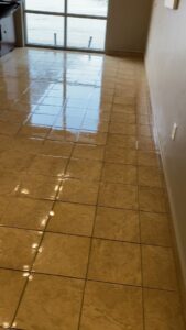 A freshly mopped, shiny tiled floor, showcasing the results of Clean Slate Cleaning Service in Green Bay, WI.