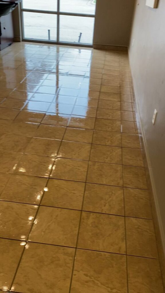 A freshly mopped, shiny tiled floor, showcasing the results of Clean Slate Cleaning Service in Green Bay, WI.