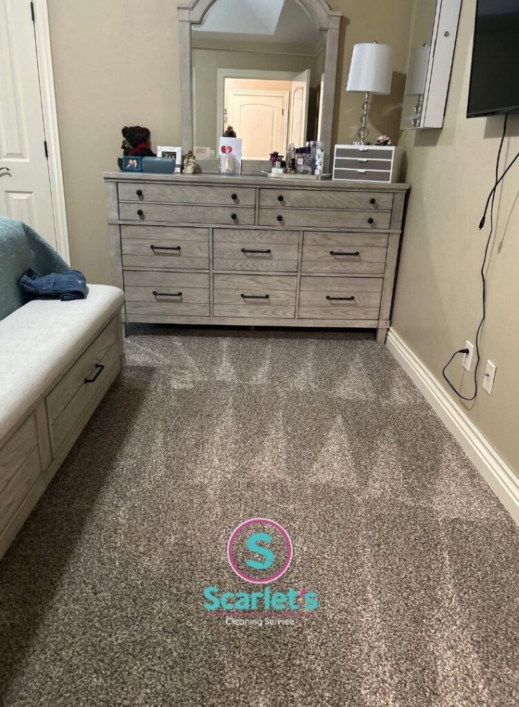 Freshly vacuumed bedroom carpet with visible lines, showcasing a clean home by Scarlet Cleaning Service LLC in Bronx, NY.