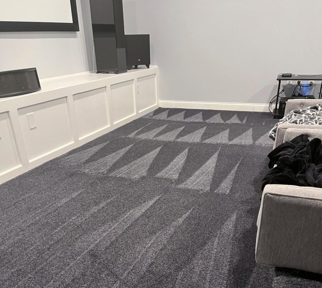 Clearly visible vacuum lines on a freshly cleaned carpet, a hallmark of Polished Housekeeping Services in Londonderry, NH.
