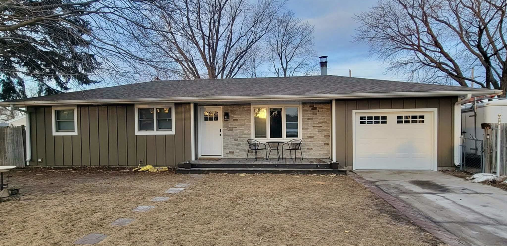 Full front view of a house with completed siding and window installation by D.A. Siding & Windows in Grand Island, NE.