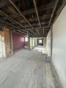 Full interior gutting project with exposed ceiling joists and stripped walls by Identical Demolition LLC in Philadelphia, PA.
