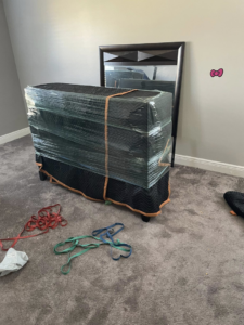 Furniture carefully wrapped and prepared for moving by ASAP Elite Hauling and Delivery in New Orleans, LA.
