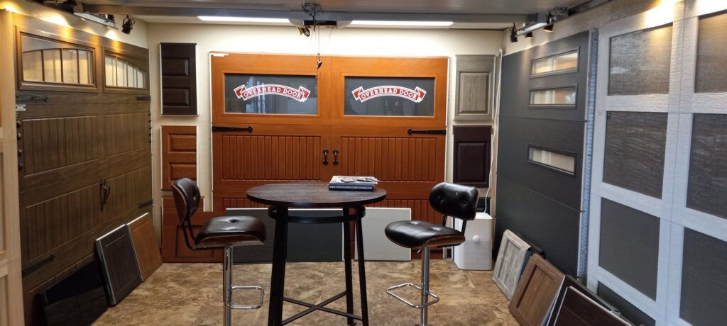 A garage door showroom display featuring various styles at Overhead Door of Sierra Nevada in Reno, NV.