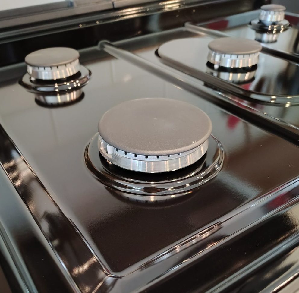 A gleaming clean stovetop after professional deep cleaning by Carissa's Green Cleaning LLC in Toledo, OH.