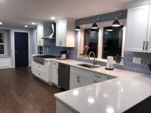 A gleaming modern kitchen with sparkling countertops and appliances, cleaned by Polished Housekeeping Services in Londonderry, NH.
