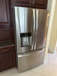 A gleaming stainless steel refrigerator, professionally cleaned and polished by Simply Clean Jax in Jacksonville, FL.
