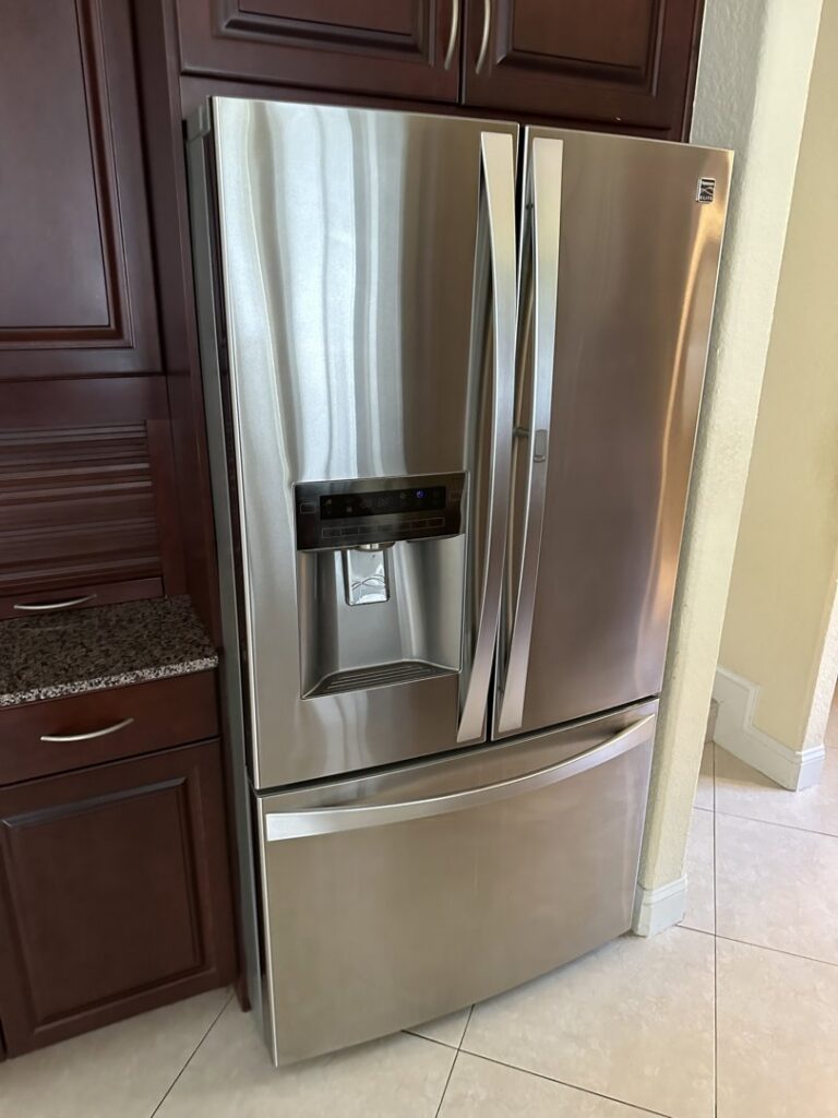 A gleaming stainless steel refrigerator, professionally cleaned and polished by Simply Clean Jax in Jacksonville, FL.