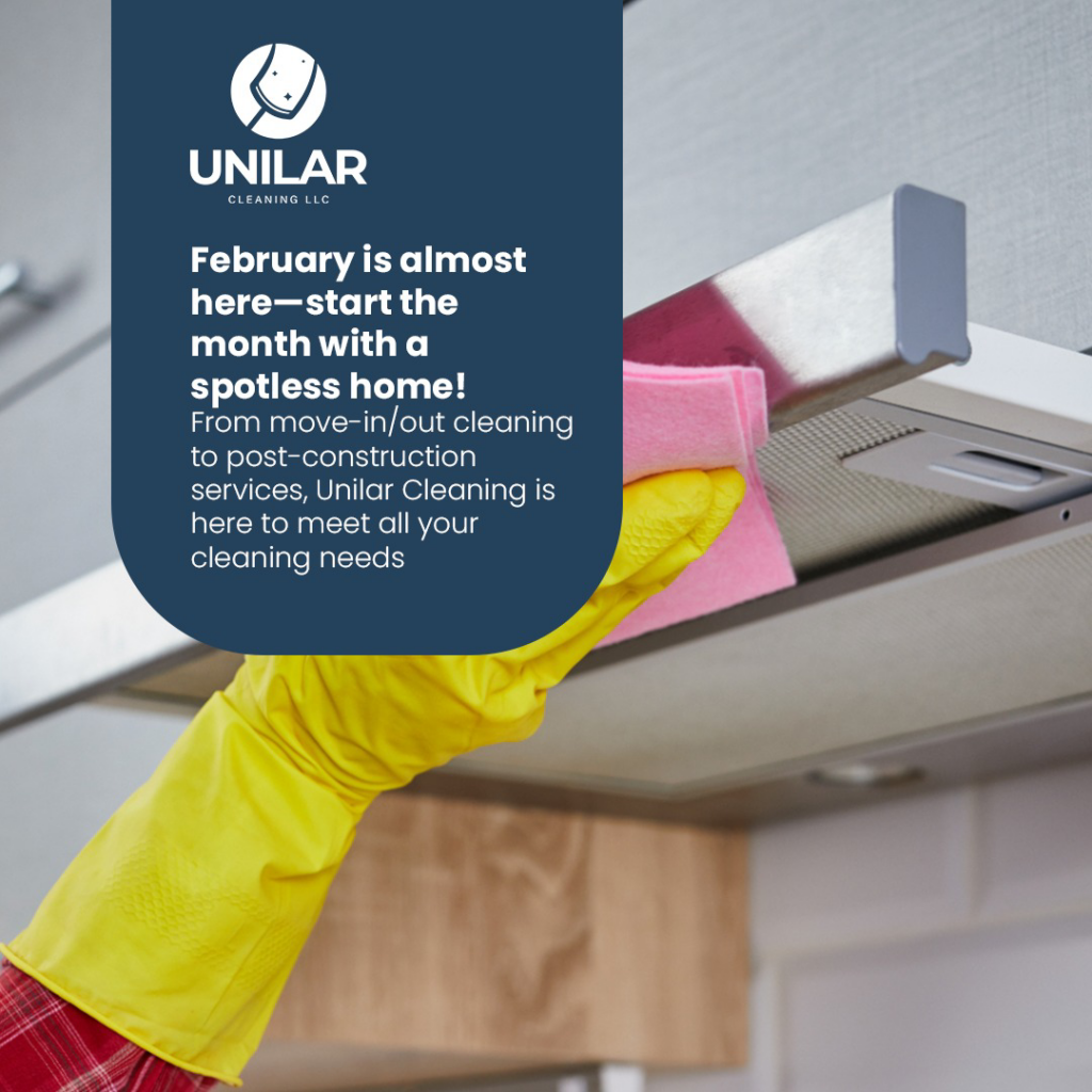 A gloved hand wiping down a kitchen range hood with a pink cloth, demonstrating cleaning services by Unilar Cleaning LLC in Pittsburgh, PA.