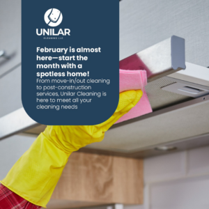 A gloved hand wiping down a kitchen range hood with a pink cloth, demonstrating cleaning services by Unilar Cleaning LLC in Pittsburgh, PA.