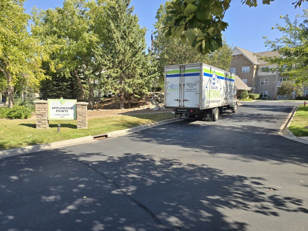 A Goal Line Moving truck parked at Applewood Pointe in Maple Grove, MN.