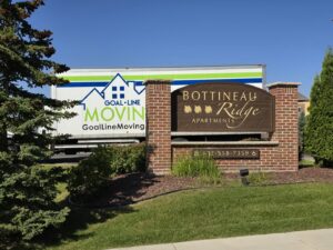 A Goal Line Moving truck parked at Bottineau Ridge Apartments in Maple Grove, MN.