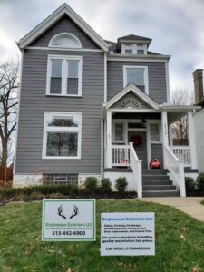A newly installed gray siding on a residential home with white trim by Stephenson Exteriors LLC in Cincinnati, OH.
