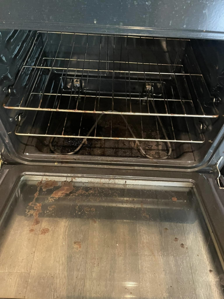 A greasy and dirty oven interior before professional deep cleaning by VM Residential cleaning LLC in Baton Rouge, LA.