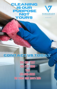 A gloved hand scrubbing a surface with a pink sponge, demonstrating house cleaning by Vanderson Environmental Remediation Services LLC in New Rochelle, NY.
