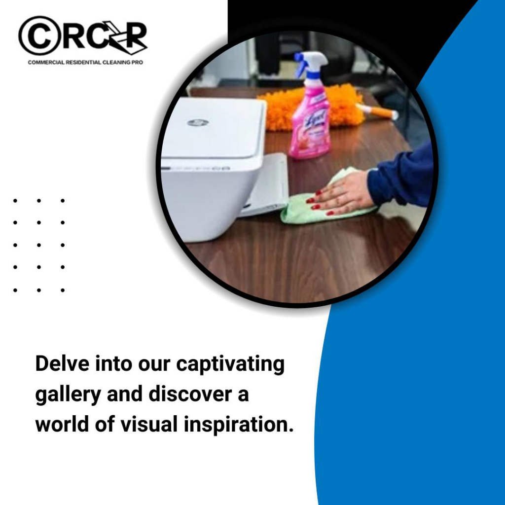 A professional cleaner's hand wiping a desk with a cloth at Commercial And Residential Cleaning Pro in Albany, NY.