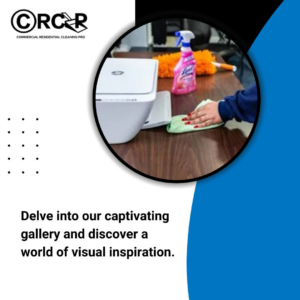 A professional cleaner's hand wiping a desk with a cloth at Commercial And Residential Cleaning Pro in Albany, NY.