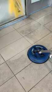 A professional hard surface water extraction machine cleaning a tiled floor by Renue Systems Of Oahu in Honolulu, HI
