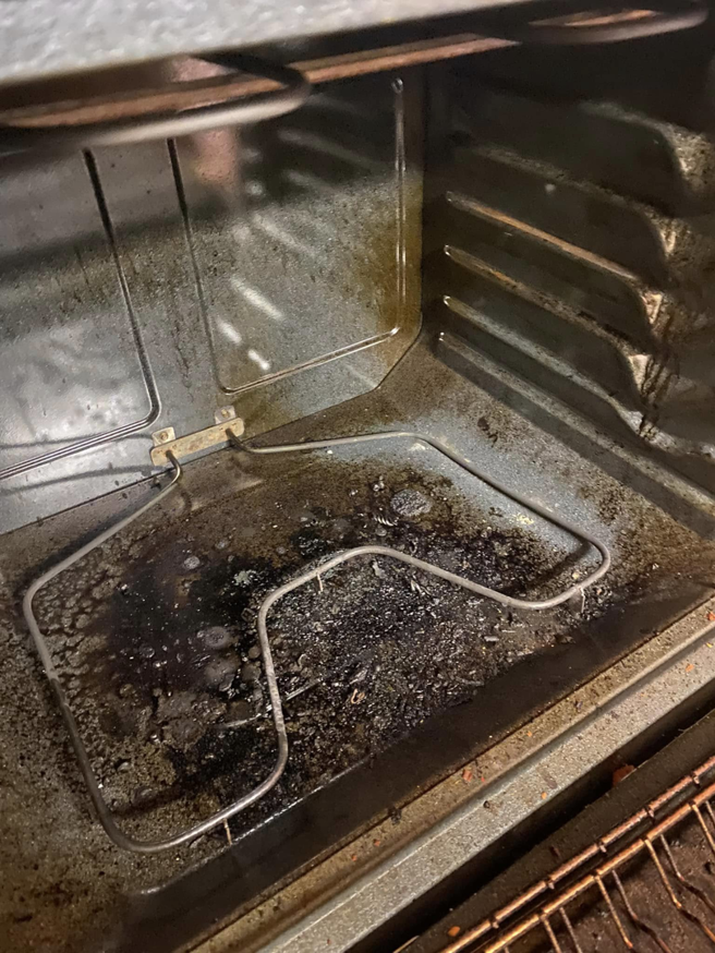 A heavily soiled oven interior, ready for deep cleaning by S&R Services LLC in Anchorage, AK.