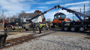 A heavy-duty train recovery operation underway by Elmquist Towing & Recovery in Ames, IA.