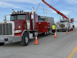 Heavy-duty truck recovery operation by Diversified Towing and Recovery, LLC in Creston, IA.