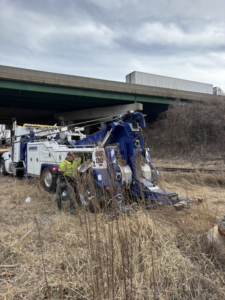 A heavy wrecker performing a recovery operation for Diversified Towing and Recovery, LLC in Creston, IA.