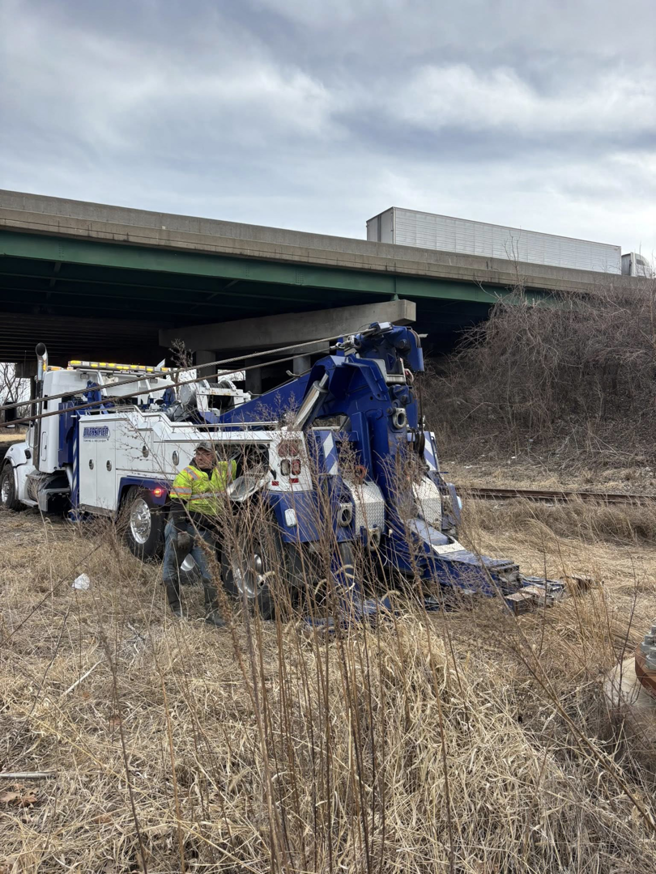 A heavy wrecker performing a recovery operation for Diversified Towing and Recovery, LLC in Creston, IA.