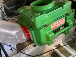 A HEPA air scrubber used for water damage restoration inside a car by Servpro of East Honolulu, HI.