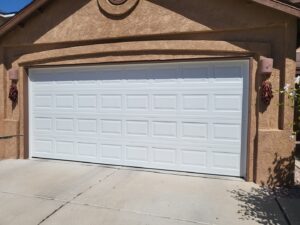 A new white horizontal panel garage door installed by Spartan Garage Doors and More in Albuquerque, NM.