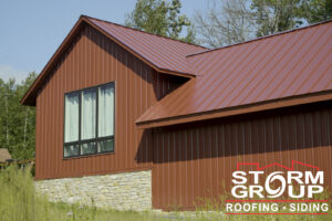 A house featuring new brown vertical siding installed by Storm Group Roofing in Brooklyn Park, MN.