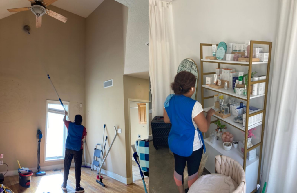 Two house cleaners from KC Lustrous Cleaning in Kansas City, MO, one cleaning a high window or wall with a pole, and another dusting shelves.