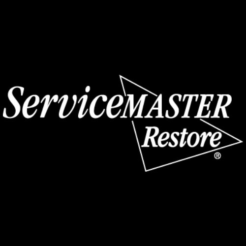 Two ServiceMaster of Lawton house cleaners dusting and cleaning shelves in a residential room in Lawton, OK.