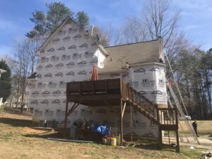 A house wrapped in HomeGuard house wrap, ready for new siding installation by HP Exteriors in Woodstock, GA