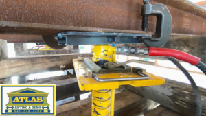 Close-up of hydraulic jacks and steel beams supporting a house lift by Atlas Lifting & Demo LLC in Hilton Head Island, SC