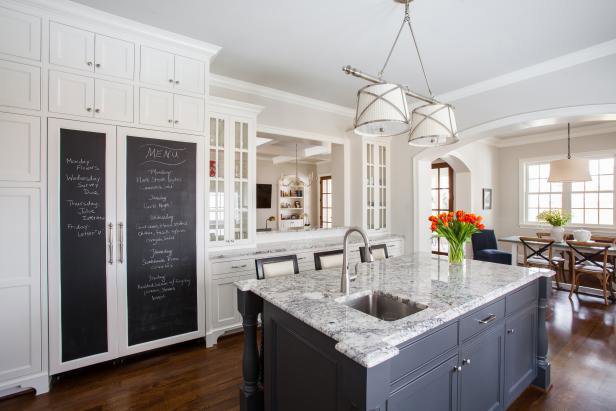 An immaculate kitchen interior with a large island, reflecting the thorough cleaning services by YQP Cleaning Services in Miami, FL.