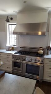 An immaculate kitchen featuring a large range, demonstrating the thorough cleaning by Jessie Clean in Indianapolis, IN.