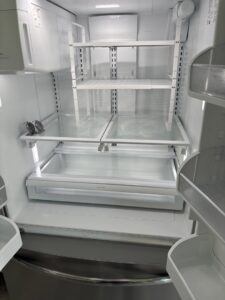 Immaculate and organized refrigerator shelves after a deep cleaning service by Maid In Indy in Indianapolis, IN.