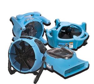 Several blue industrial air movers and drying fans, essential equipment for water damage restoration by 24HR Flood Pros of OKC in Oklahoma City, OK.