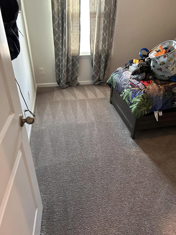 A child's bedroom carpet freshly vacuumed by Five Star Cleaning Service in Pasadena, MD.