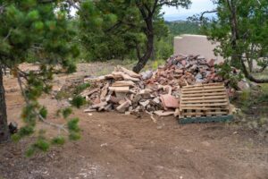 A pile of stone and brick debris from a landscaping and hardscaping project by Pro Scape in Eustis, FL.
