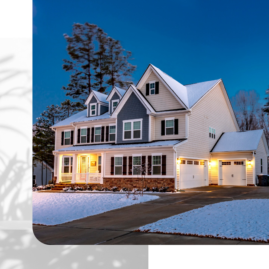 Large house showcasing mixed siding types including horizontal, shake, and stone veneer by Southwestern Remodeling in Wichita, KS