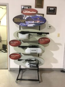 A display of LiftMaster garage door openers, including belt and chain drive models, at Hickman Overhead Door in Milford, DE.